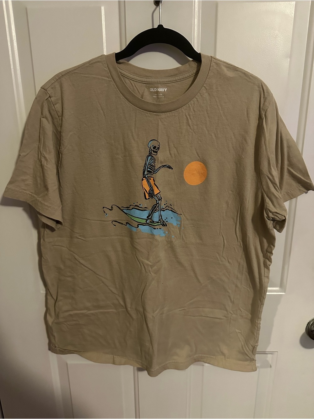 Old Navy Men’s Tan Surfing Skeleton Graphic Tee with Orange & Blue Accents